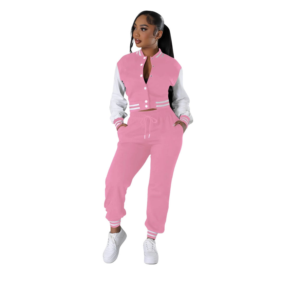 Modern spliced buckle two-piece set from Plush Fashion Hub, featuring stylish design and coordinated top and bottom pieces.