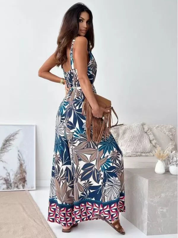 Printed spaghetti strap wide-leg jumpsuit by Plush Fashion Hub, showing the stylish design and vibrant pattern on the fabric.