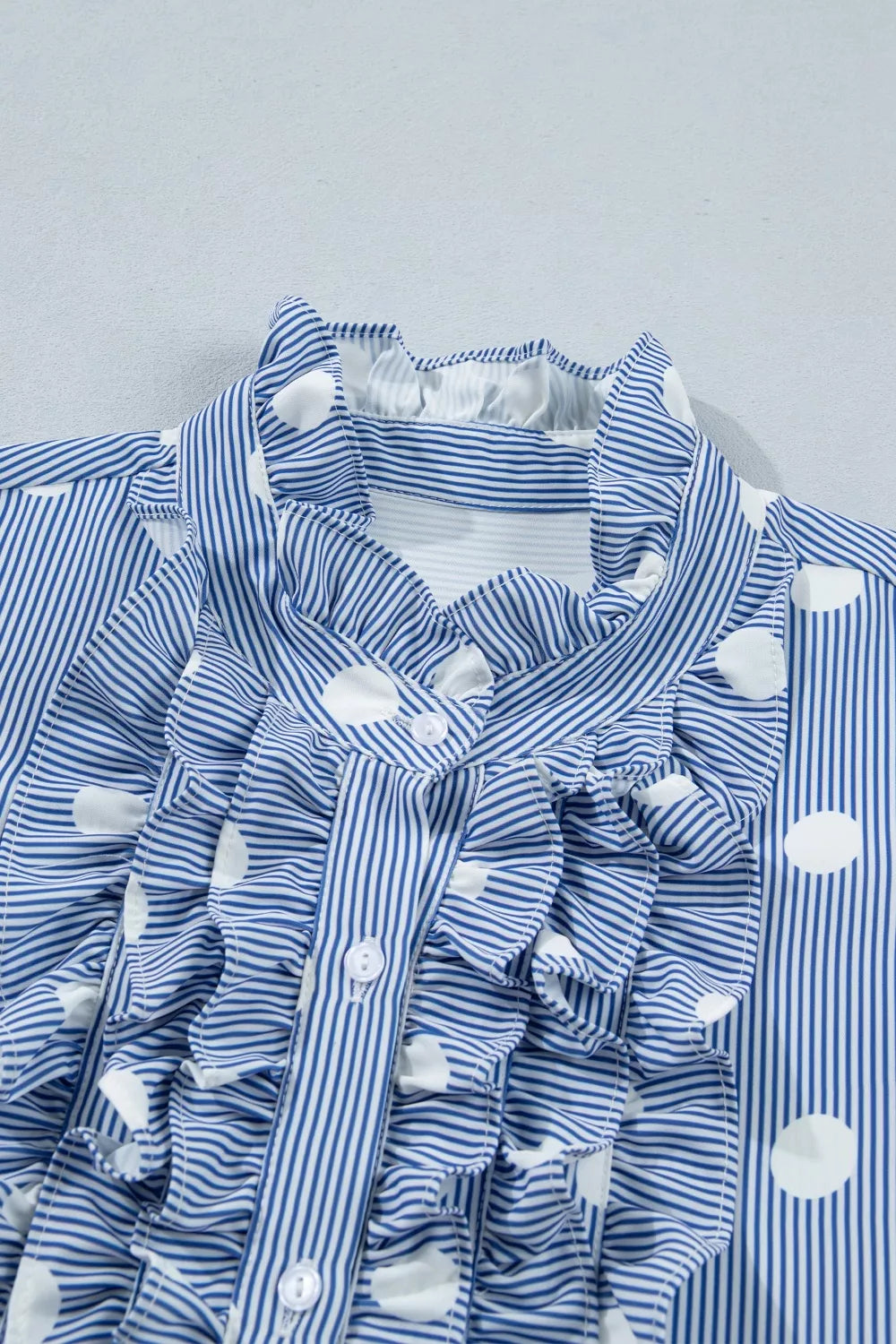 Plush Fashion Hub stripe contrast polka dot print pleated ruffle sleeve shirt, showcasing a stylish design with pleats and ruffle accents.