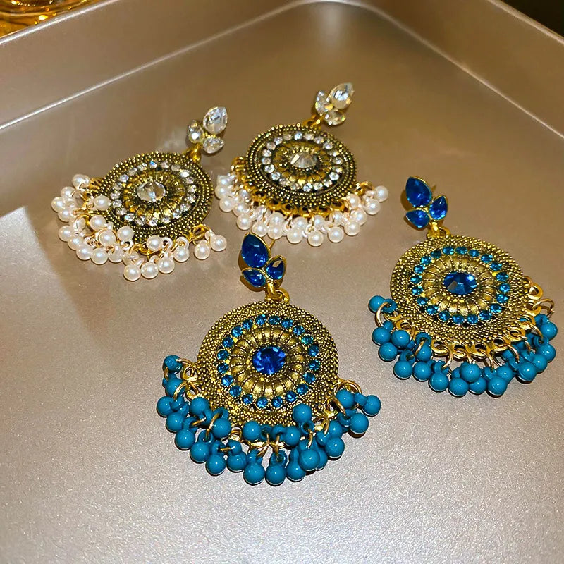 Rhinestone alloy bead dangle earrings featuring sparkling stones and intricate design, perfect for stylish fashion accessories.