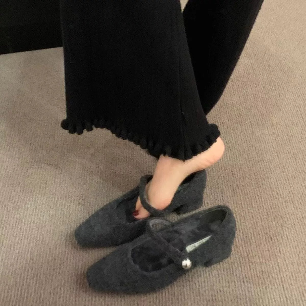 Elegant block heel loafers by Trendsi, showing a close-up of stylish shoes with a sleek design and comfortable heel.