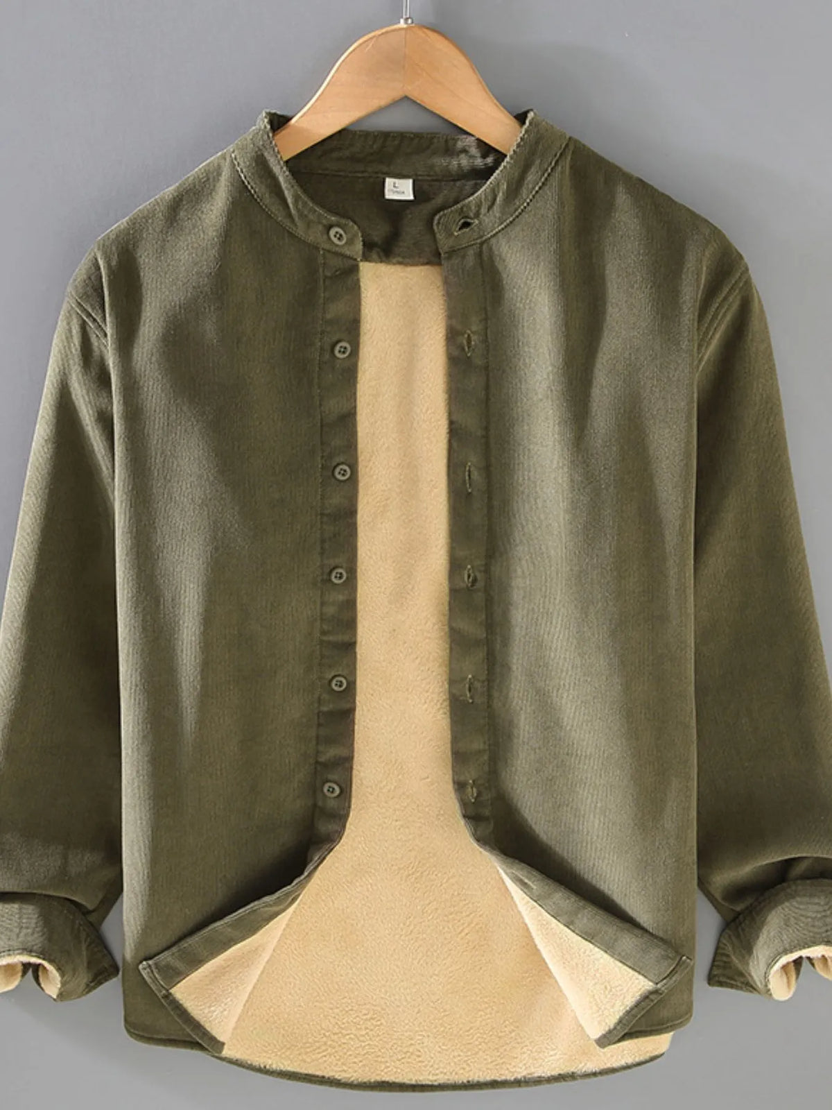 Plus size men's button-up long sleeve jacket by Trendsi, shown in a stylish, casual design with front buttons and a collar.