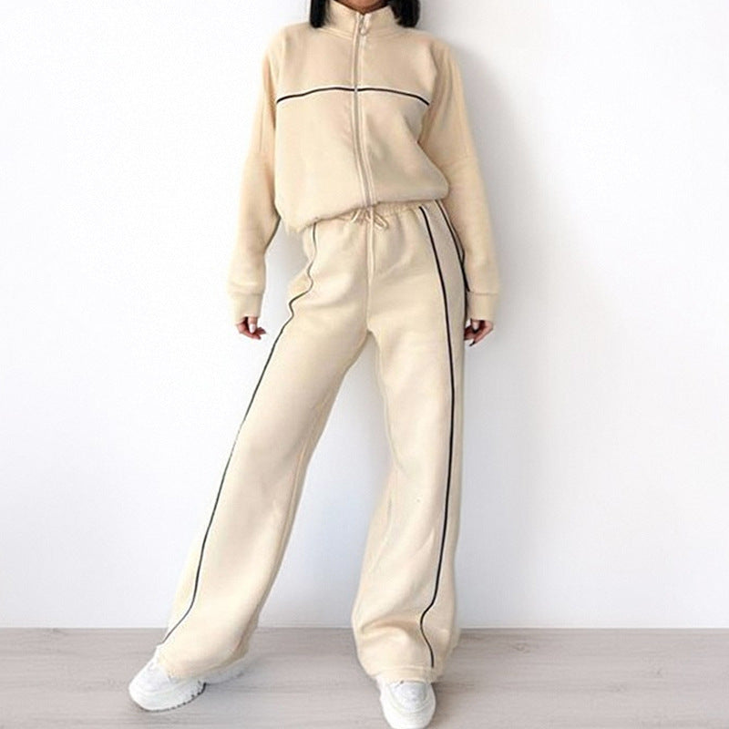 Relaxed tie-waist hoodie and matching tracksuit pants from Plush Fashion Hub, two-piece set designed for comfort.