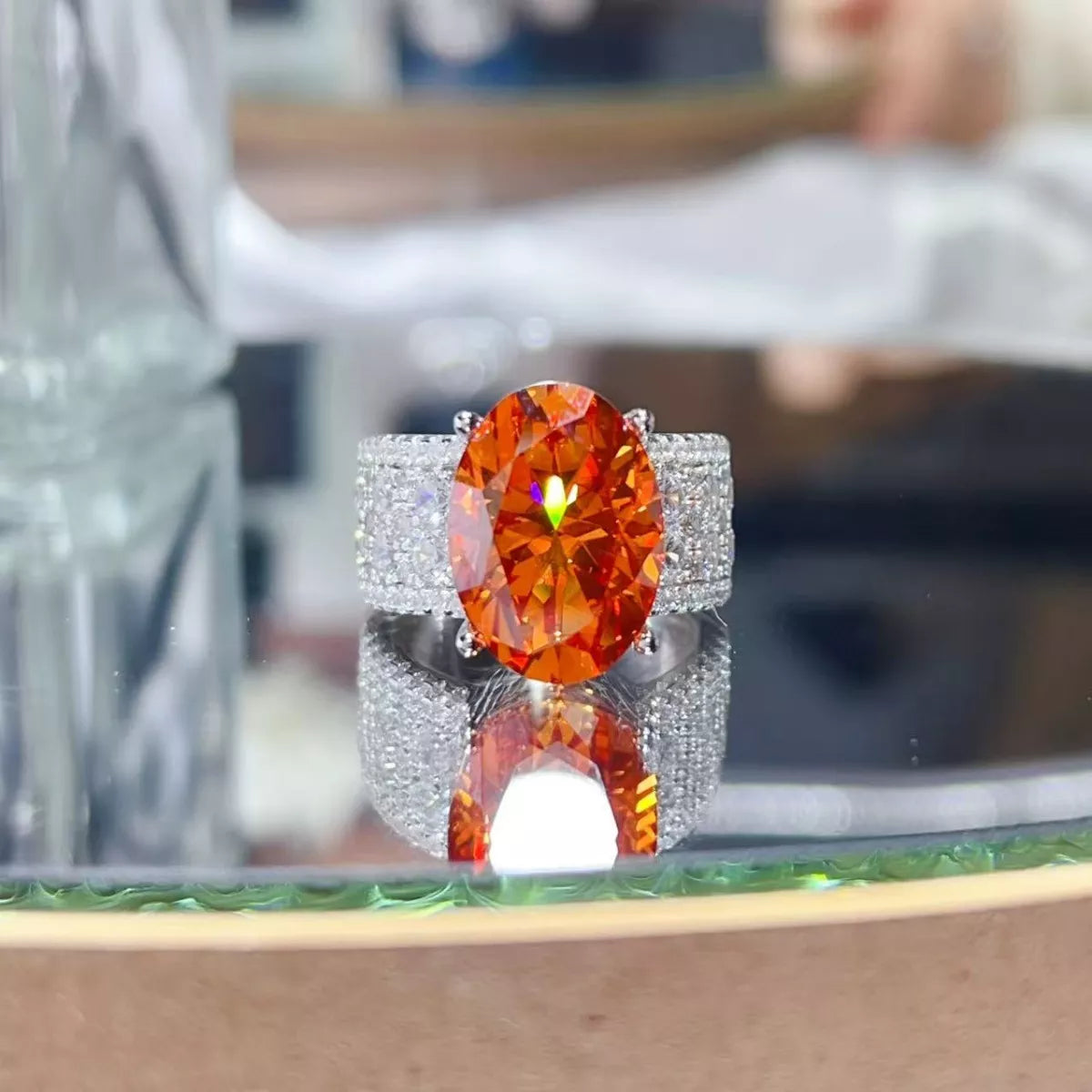 Sterling silver ring with an 8-carat moissanite gemstone, showcasing a sparkling, elegant jewelry piece.