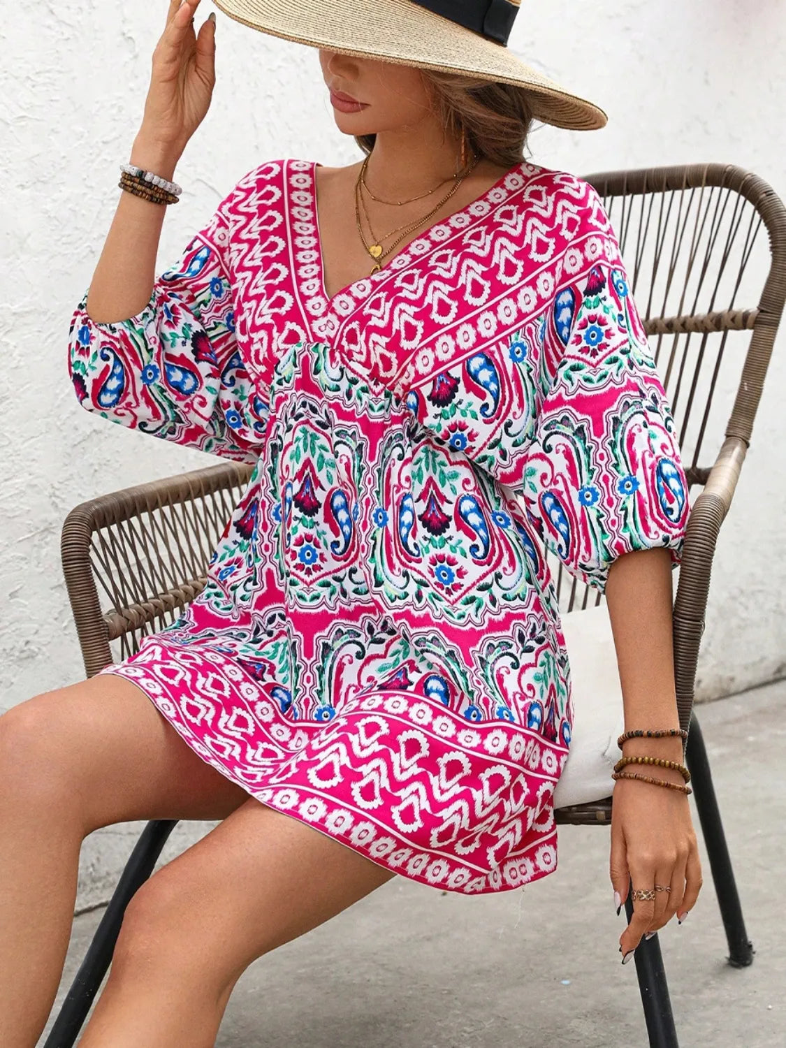Printed tie-back half sleeve mini dress from Plush Fashion Hub, showing a stylish mini dress with a tie-back design and half sleeves.