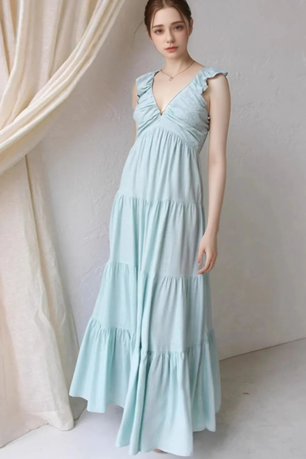 Women’s 100% cotton ruffled V-neck tiered midi dress by Plush Fashion Hub, featuring a flowy, layered design and ruffled details.