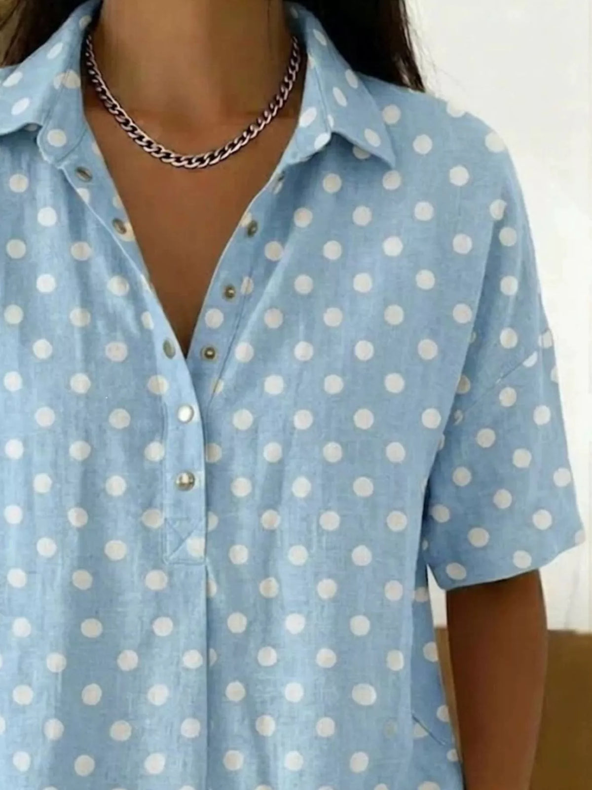 Plus size polka dot short sleeve shirt from Trendsi, featuring a full-size top with a classic polka dot pattern.