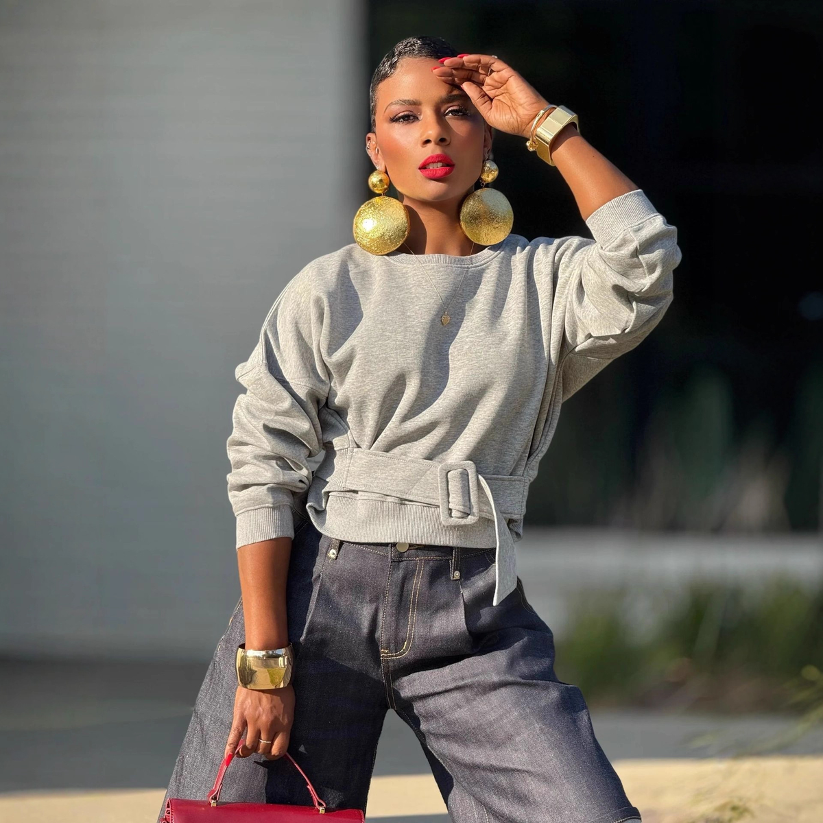 Gray hooded crop sweatshirt by Plush Fashion Hub featuring a relaxed fit and soft fabric, perfect for casual wear.