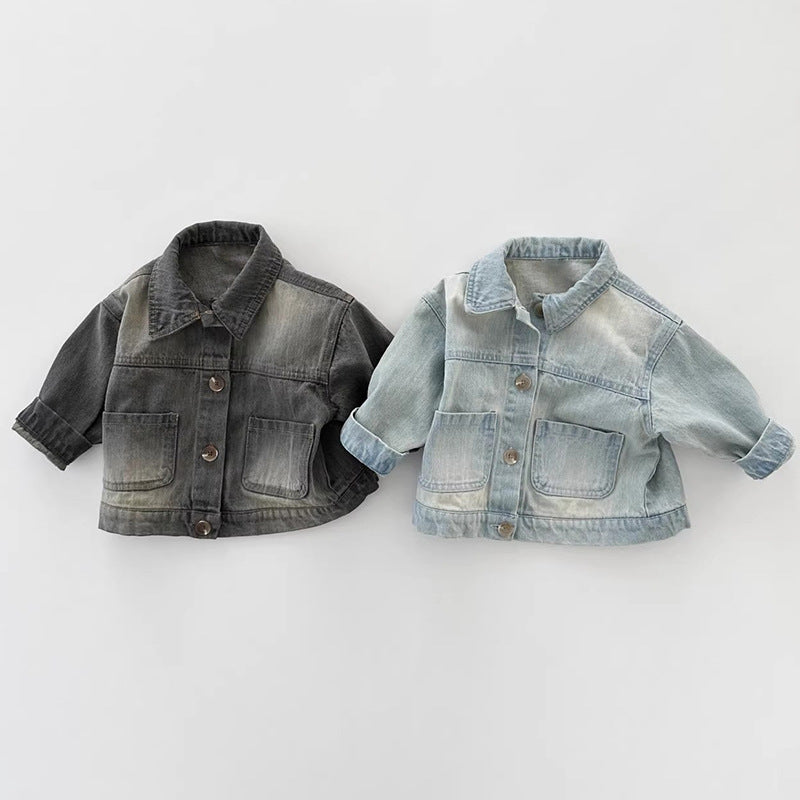 Two denim jackets in dark grey and light blue, featuring front buttons and dual pockets.