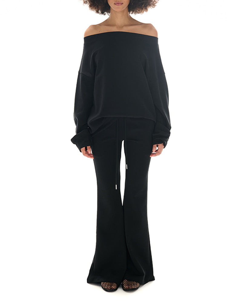 Plush Fashion Hub outfit set featuring a shoulder cut-out crop top and matching flared sweatpants, stylish and comfortable for casual wear.