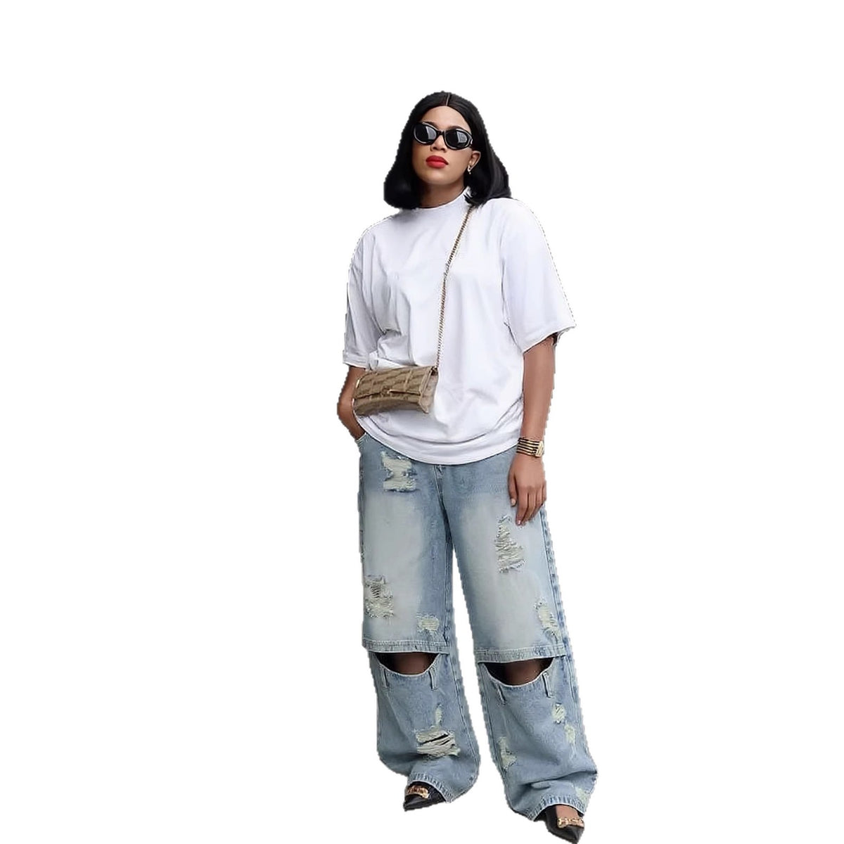 Light wash distressed ripped knee denim jeans by Plush Fashion Hub with frayed details and casual fit.