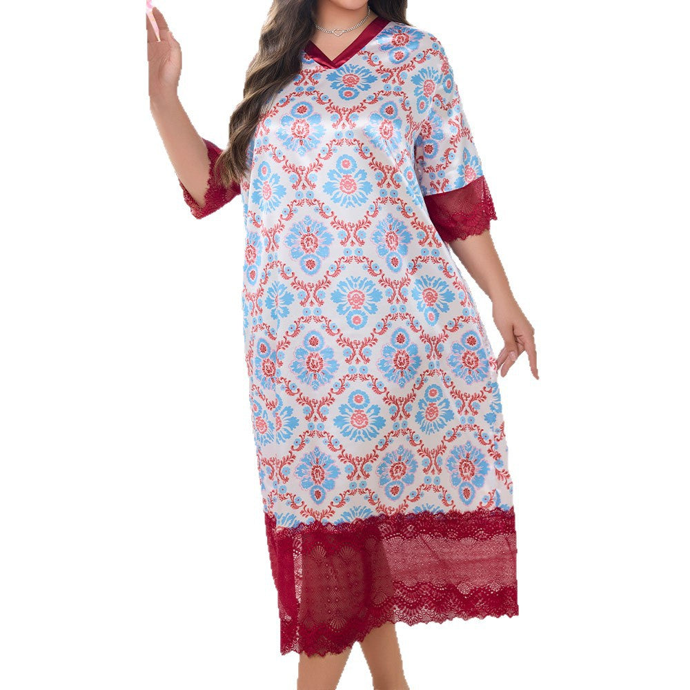 A model wears a white, red, and blue patterned plus-size nightgown with lace trim on the hem and sleeves.