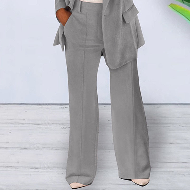 Plush Fashion Hub slim fit blazer with notched collar, tailored outerwear in a sophisticated design, shown on a hanger.