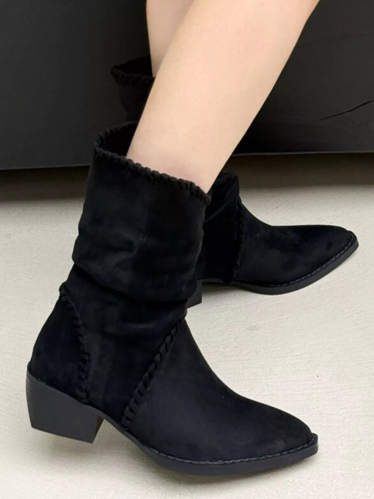 Point toe block heels boots by Trendsi, stylish footwear with a sleek pointed toe and chunky heel, perfect for fashion-forward looks.