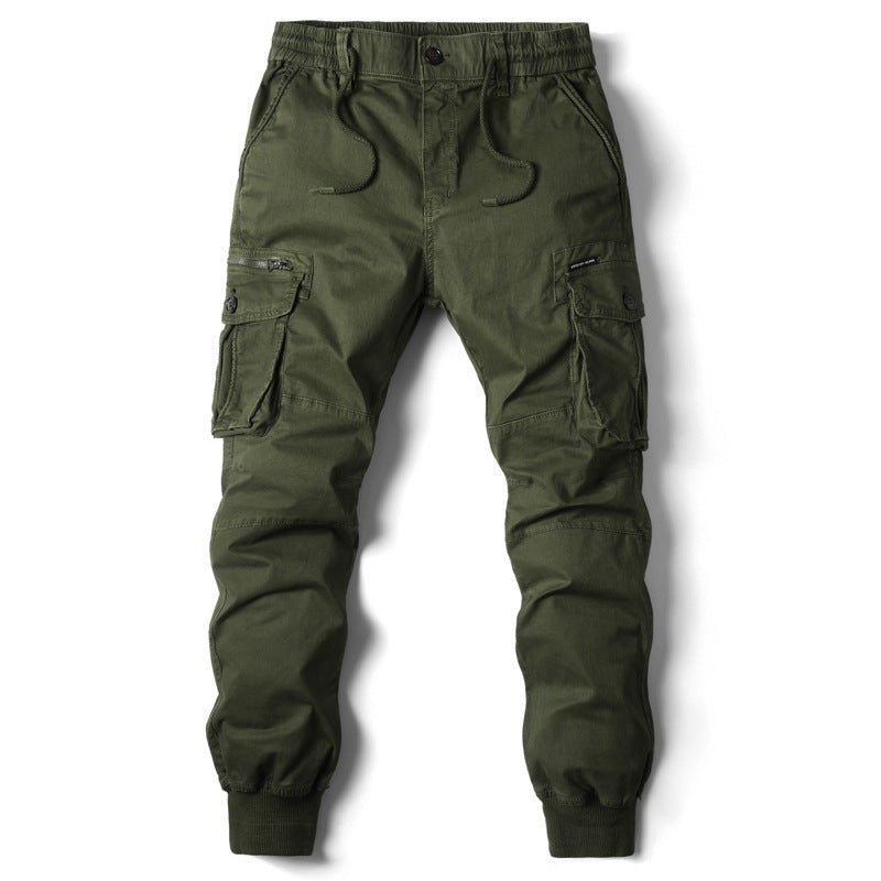 Olive green cotton cargo pants, solid pattern, casual style, elastic waist, drawstring, multiple pockets, cuffed ankles.