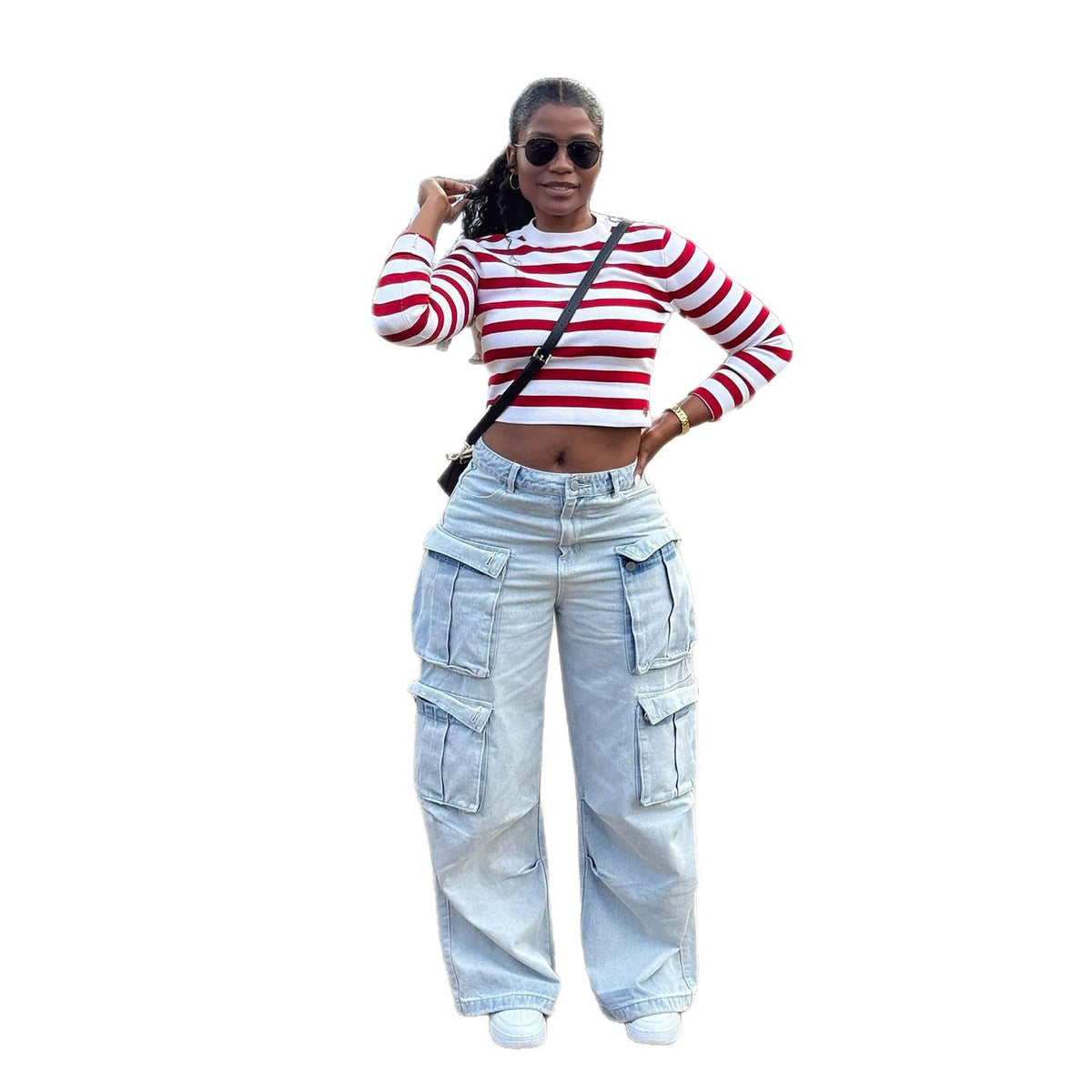 Light wash cargo jeans pants with multiple pockets and street style design by eprolo, shown on a model.