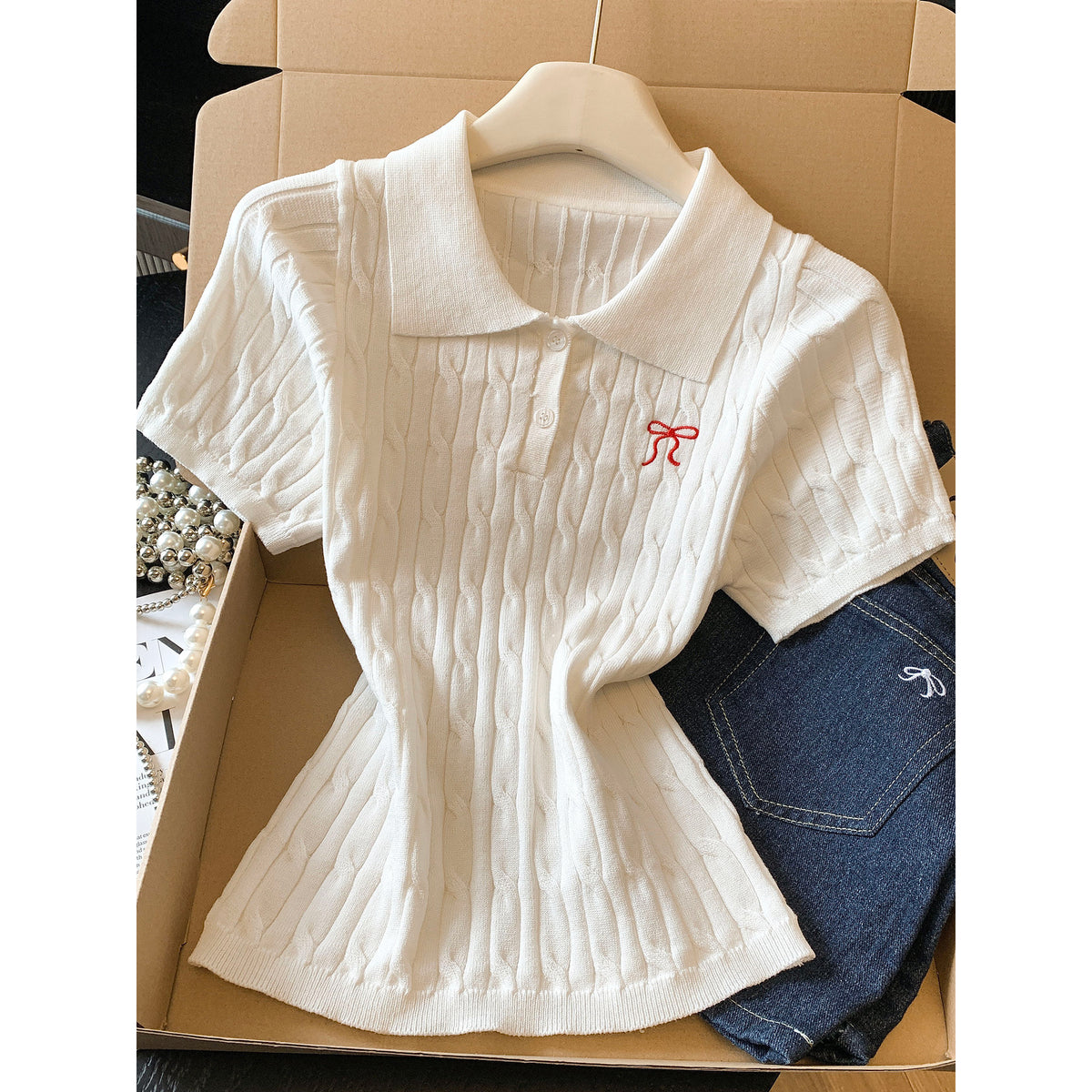 Eprolo women's knitted top with a classic polo neck, featuring a fitted design and soft, warm fabric for casual or office wear.