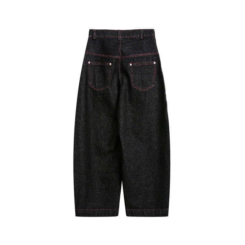 Black denim high-waist wide-leg pants with red stitching and two back pockets.