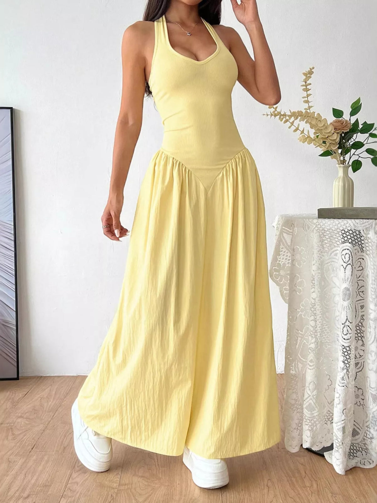 Plush Fashion Hub halter neck ruched maxi dress in flowing fabric, featuring a fitted bodice and elegant length.