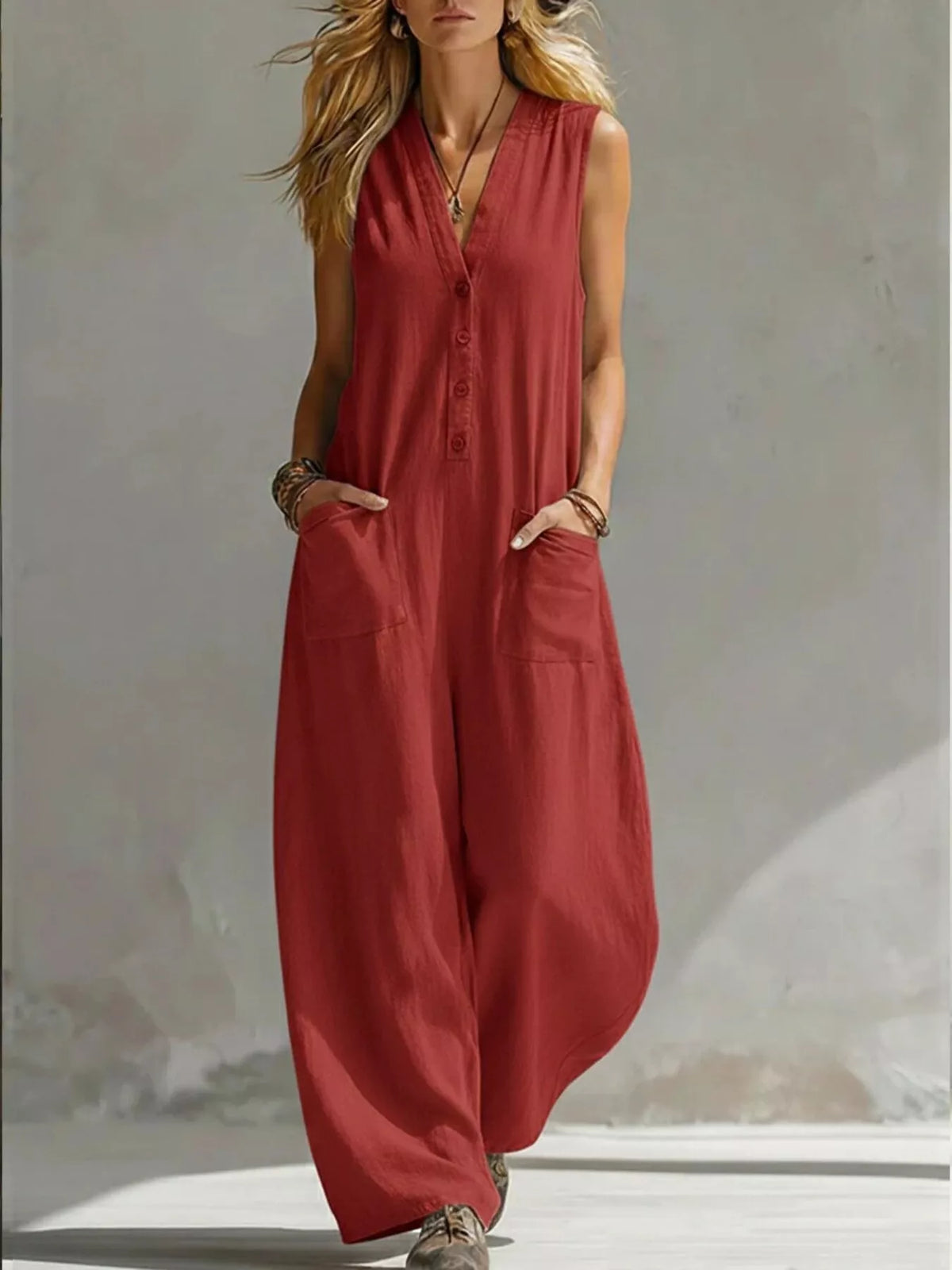 Plus size full-length V-neck sleeveless wide-leg jumpsuit by Plush Fashion Hub, shown in a stylish, comfortable fit.