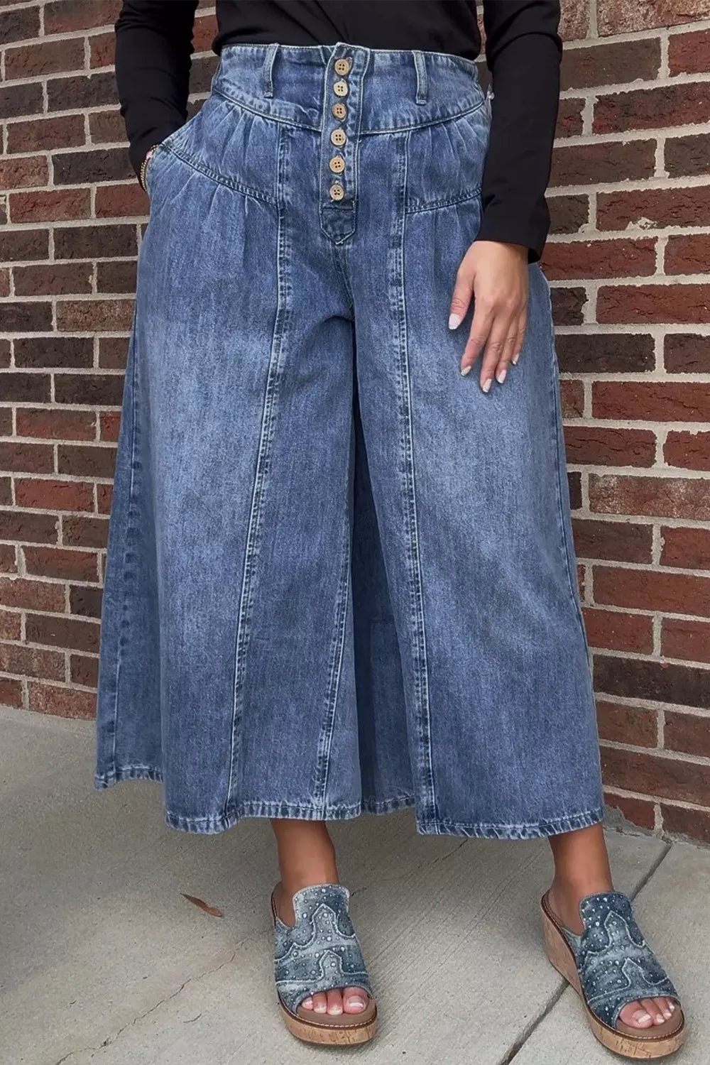 High-waisted wide-leg cotton denim jeans by Plush Fashion Hub with button fly, shown on a model against a neutral background.