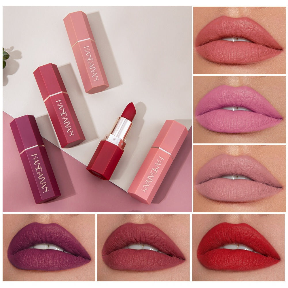Matte lipsticks in various pink, red, and purple shades with matching hexagonal tubes and swatches on lips.