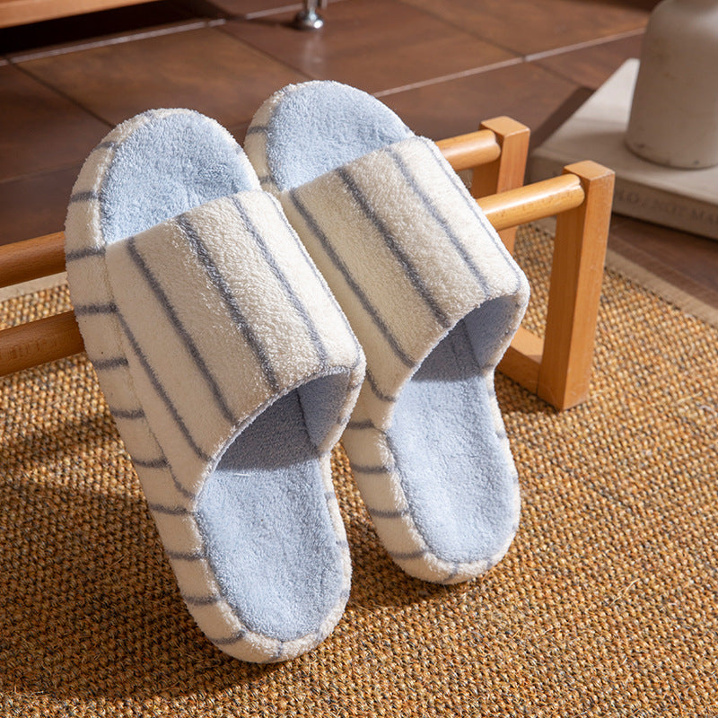 Unisex plush faux fur indoor slippers with anti-slip soles from Plush Fashion Hub, cozy and comfortable for home use.