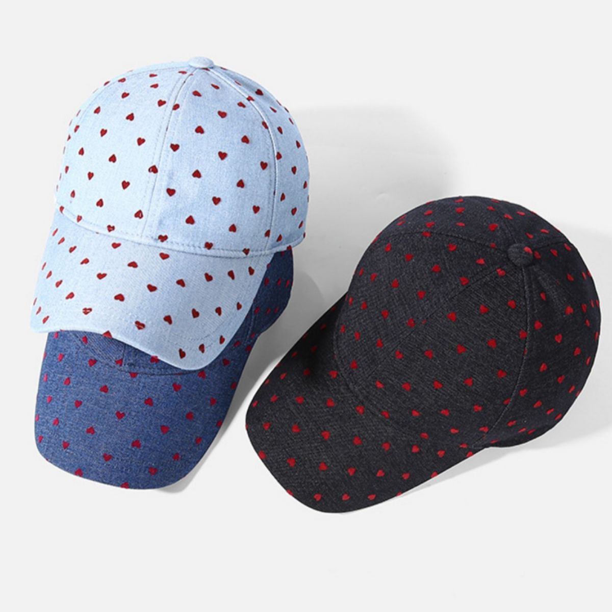 Women’s heart print casual baseball hat by Plush Fashion Hub, adjustable sport cap with stylish heart pattern for everyday wear.