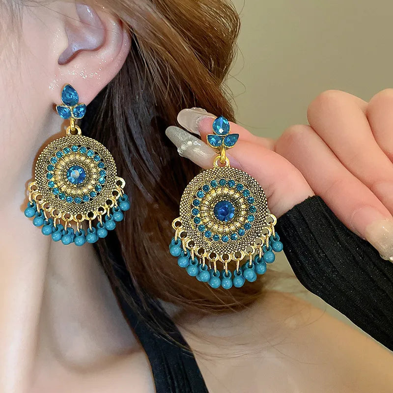 Rhinestone alloy bead dangle earrings with sparkling stones, stylish jewelry accessory from Plush Fashion Hub.