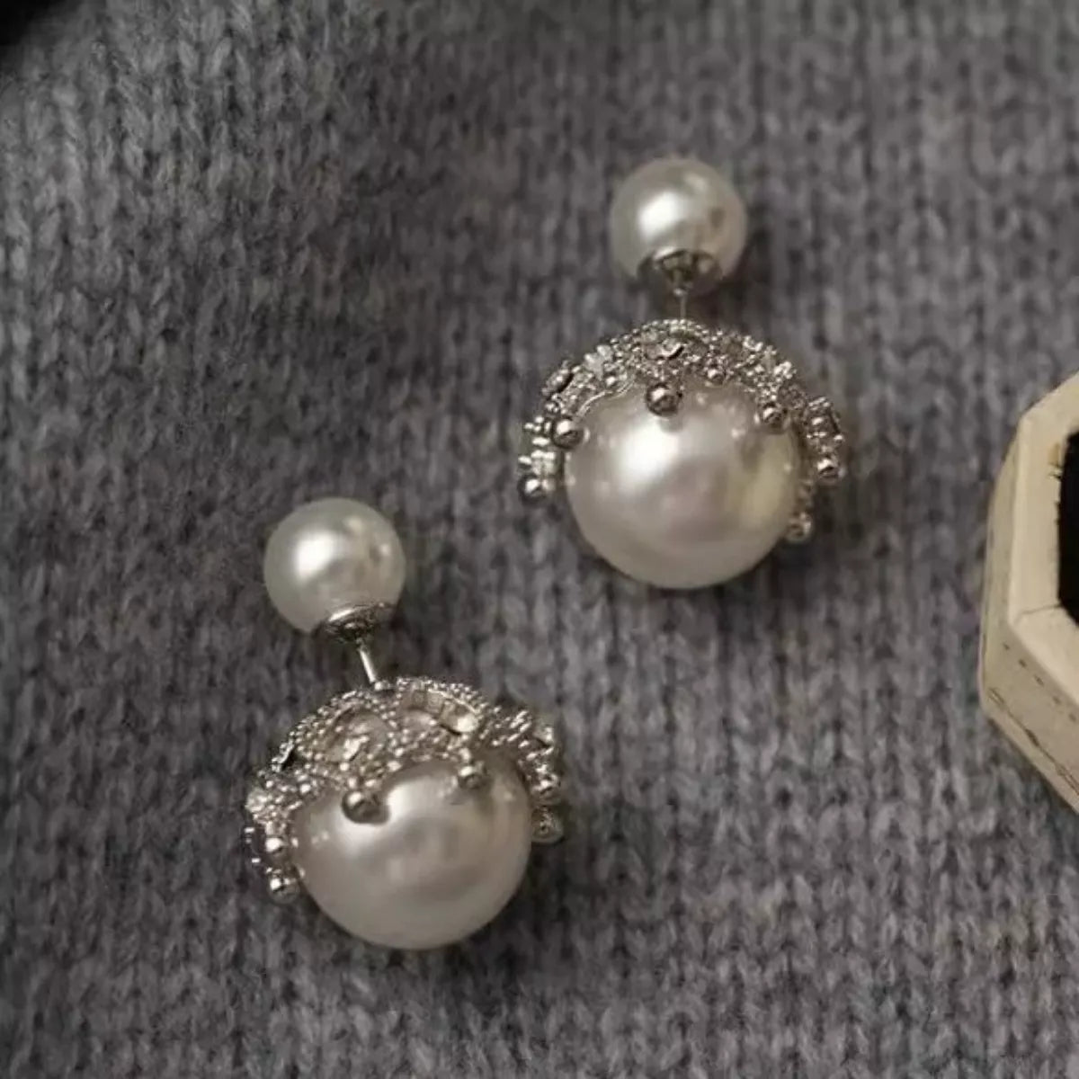 Elegant pearl stud earring from Plush Fashion Hub featuring a classic white pearl on a silver post.