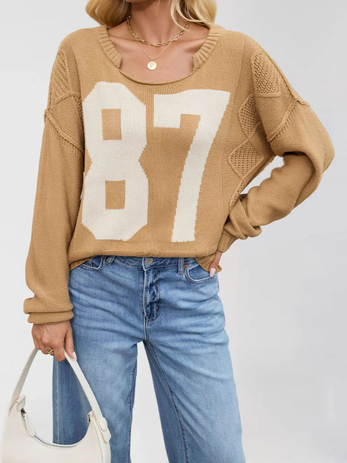 Cable-knit sweater with 78 numbers, trendy knit top by Trendsi, featuring a cozy, textured design in a stylish casual fit.