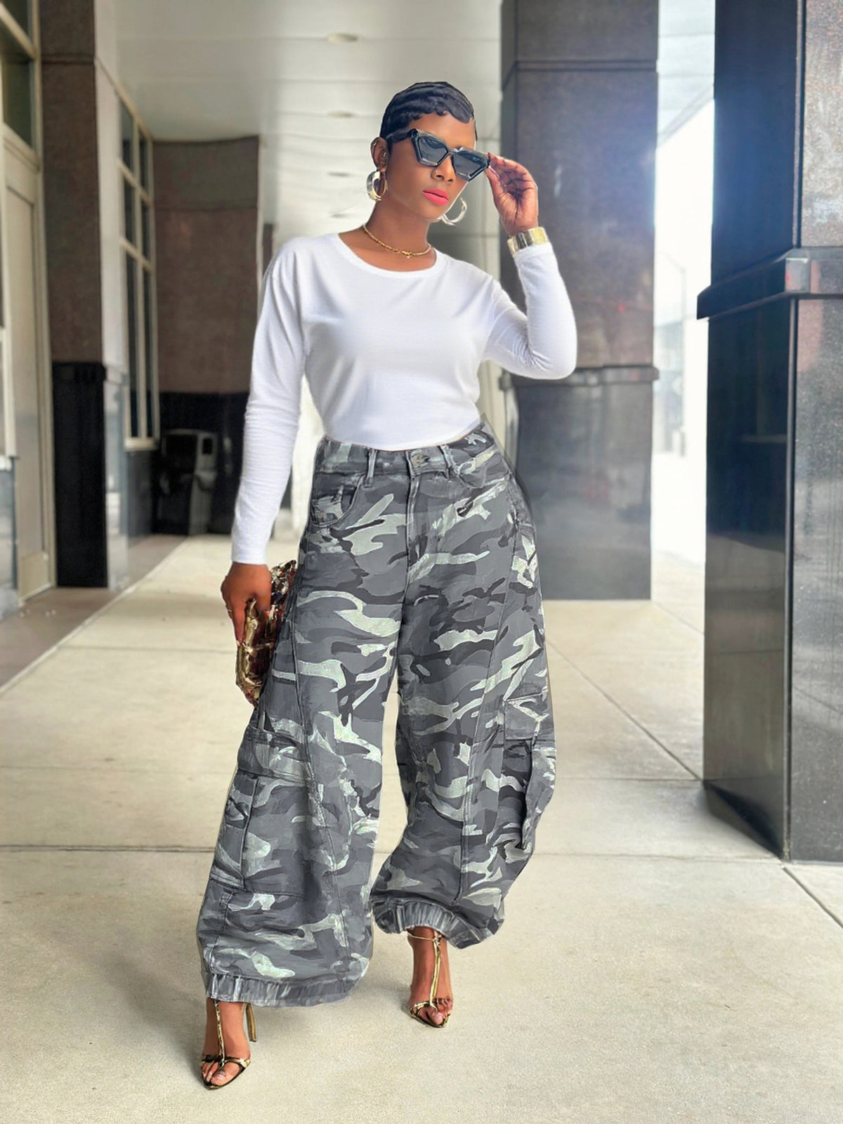 Women’s camouflage wide-leg cargo denim jeans by Plush Fashion Hub, featuring a stylish camouflage pattern and relaxed fit.
