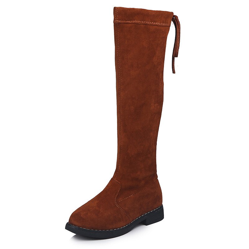 Brown suede over-the-knee boot, flat style, featuring a tie detail at the back collar and a black sole.