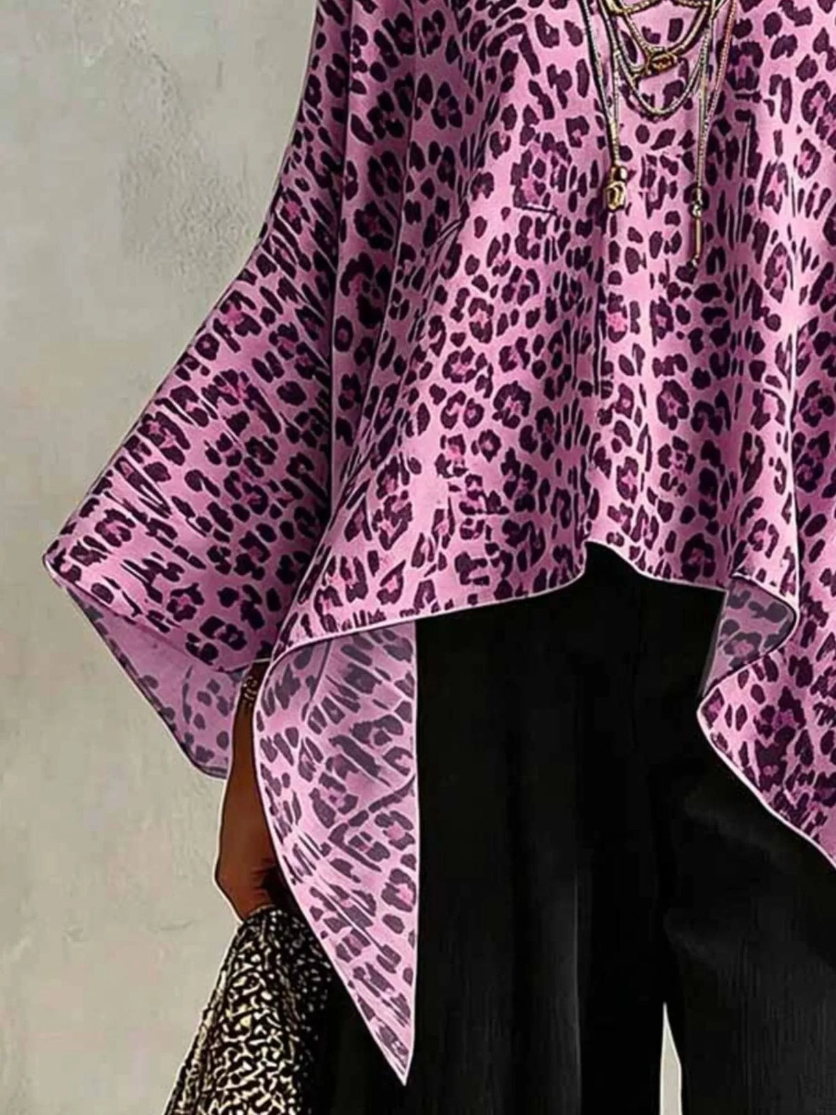 Plus size leopard print asymmetrical hem top by Plush Fashion Hub featuring a stylish, flowy design and bold animal print.