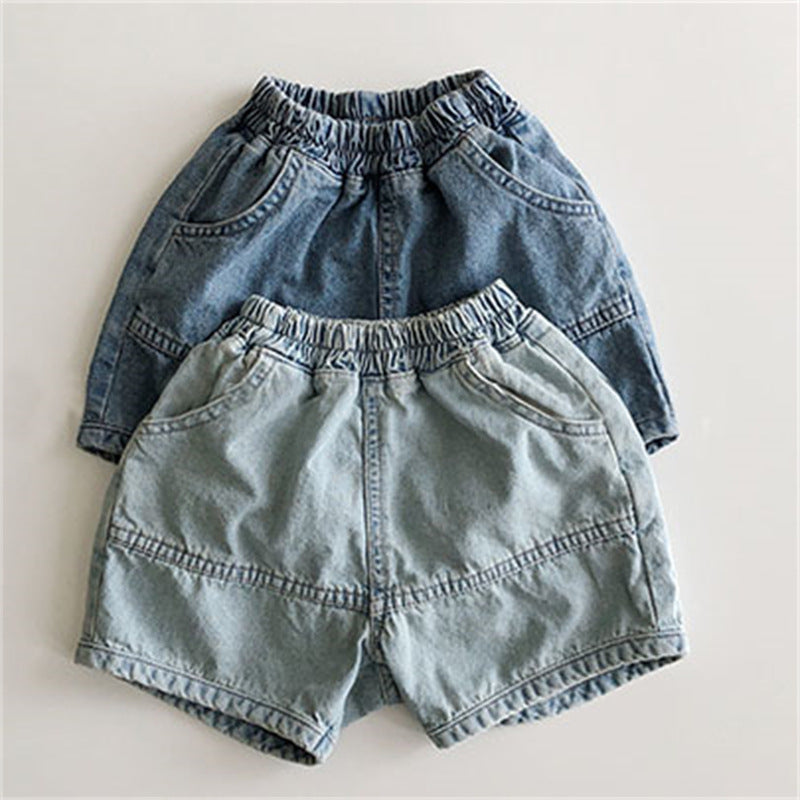 Two pairs of denim shorts in light and dark blue, with elastic waistbands, front pockets, and panel seams.