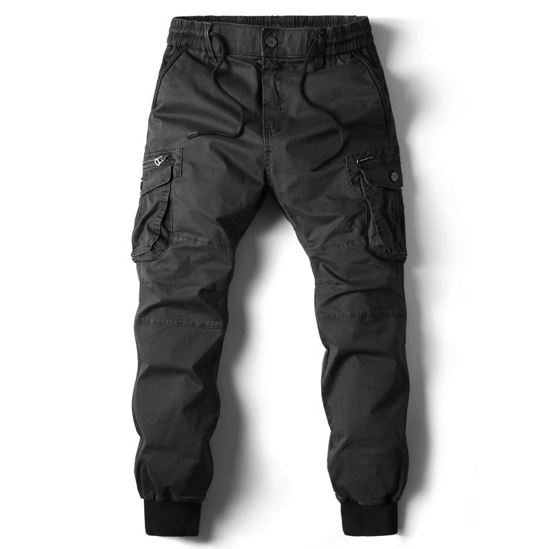 Black cotton cargo joggers with elastic waistband, drawstring, and multiple utility pockets.