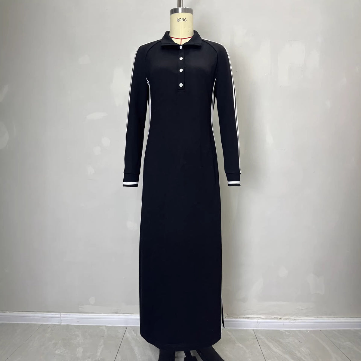 White women's long skirt dress with a rolled edge hoodie, button neckline, and simple style by eprolo.