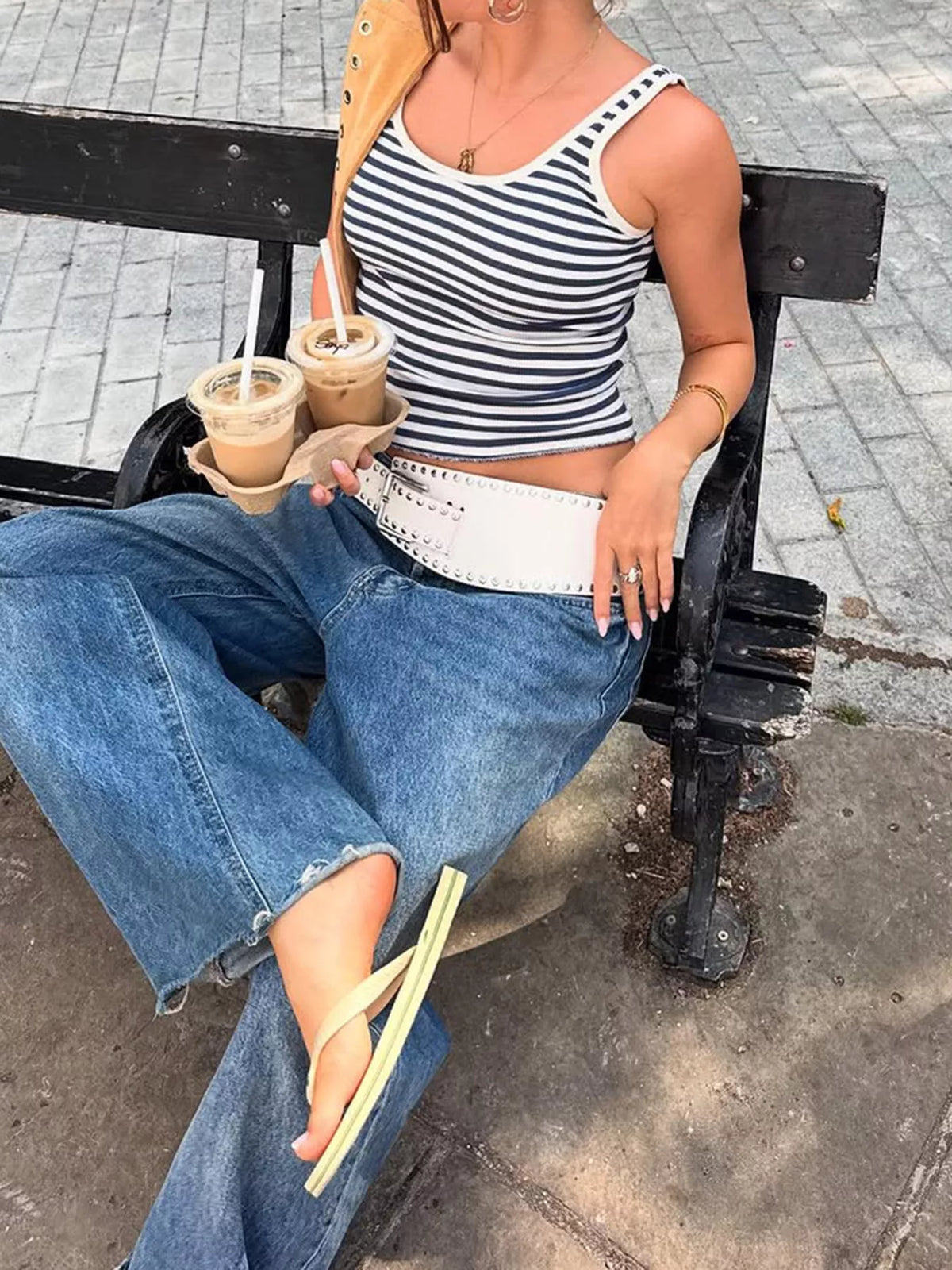 Striped scoop neck tank top by Plush Fashion Hub, casual sleeveless top with bold horizontal stripes and comfortable fit.