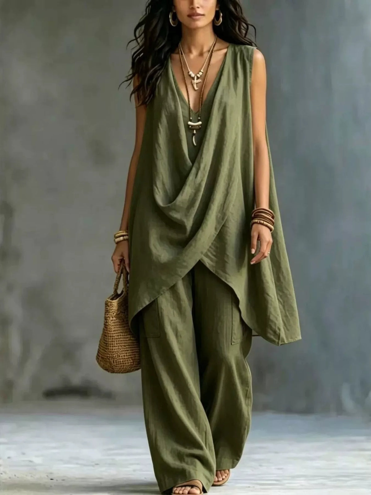 Plush Fashion Hub sleeveless asymmetrical top with wide-leg pants set, stylish and comfortable fashion ensemble.