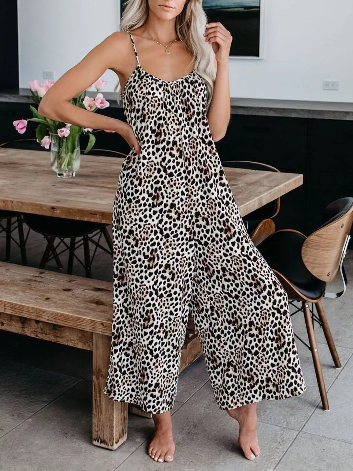 Plus size tie-dye wide leg jumpsuit by Plush Fashion Hub, featuring a colorful full-length jumpsuit with a relaxed fit and wide legs.