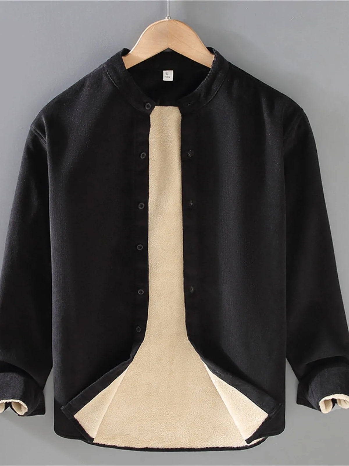 Plus size men's button-up long sleeve jacket by Trendsi, featuring a stylish fit and classic design, shown in the image.