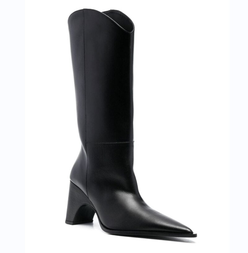 Black leather knee-high boot, pointed toe, flared block heel, and curved top edge.