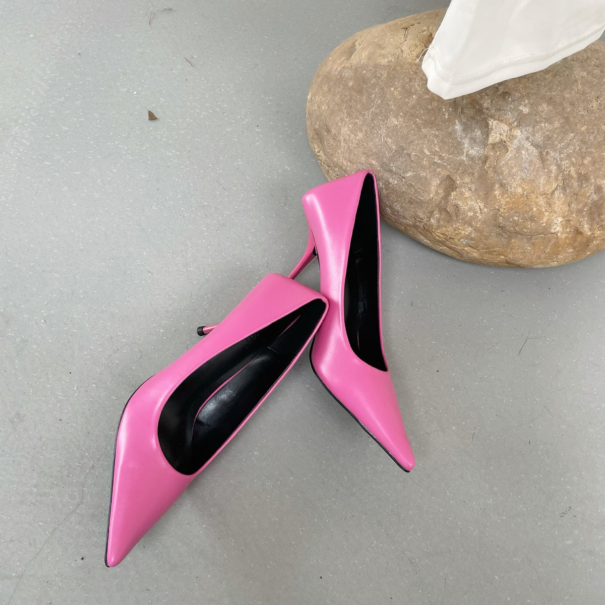 Women's premium leather pointed-toe stiletto pumps by Plush Fashion Hub, stylish black heels with sleek design.