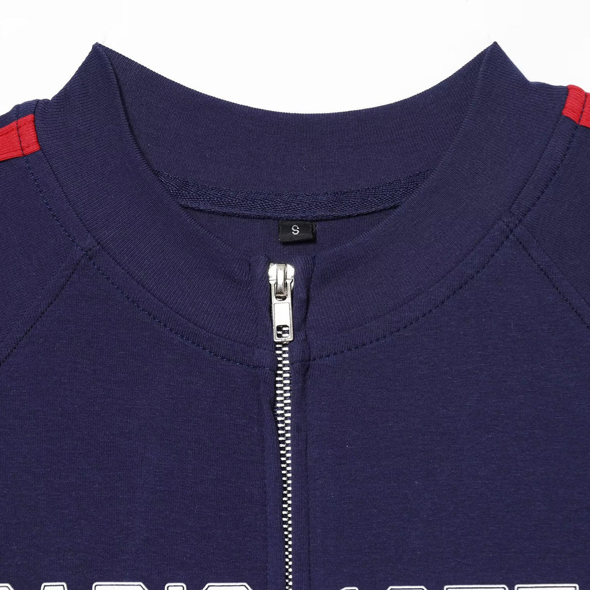 Dark blue sleeveless top by Plush Fashion Hub with zipper embellishments and printed design, perfect for casual or stylish wear.