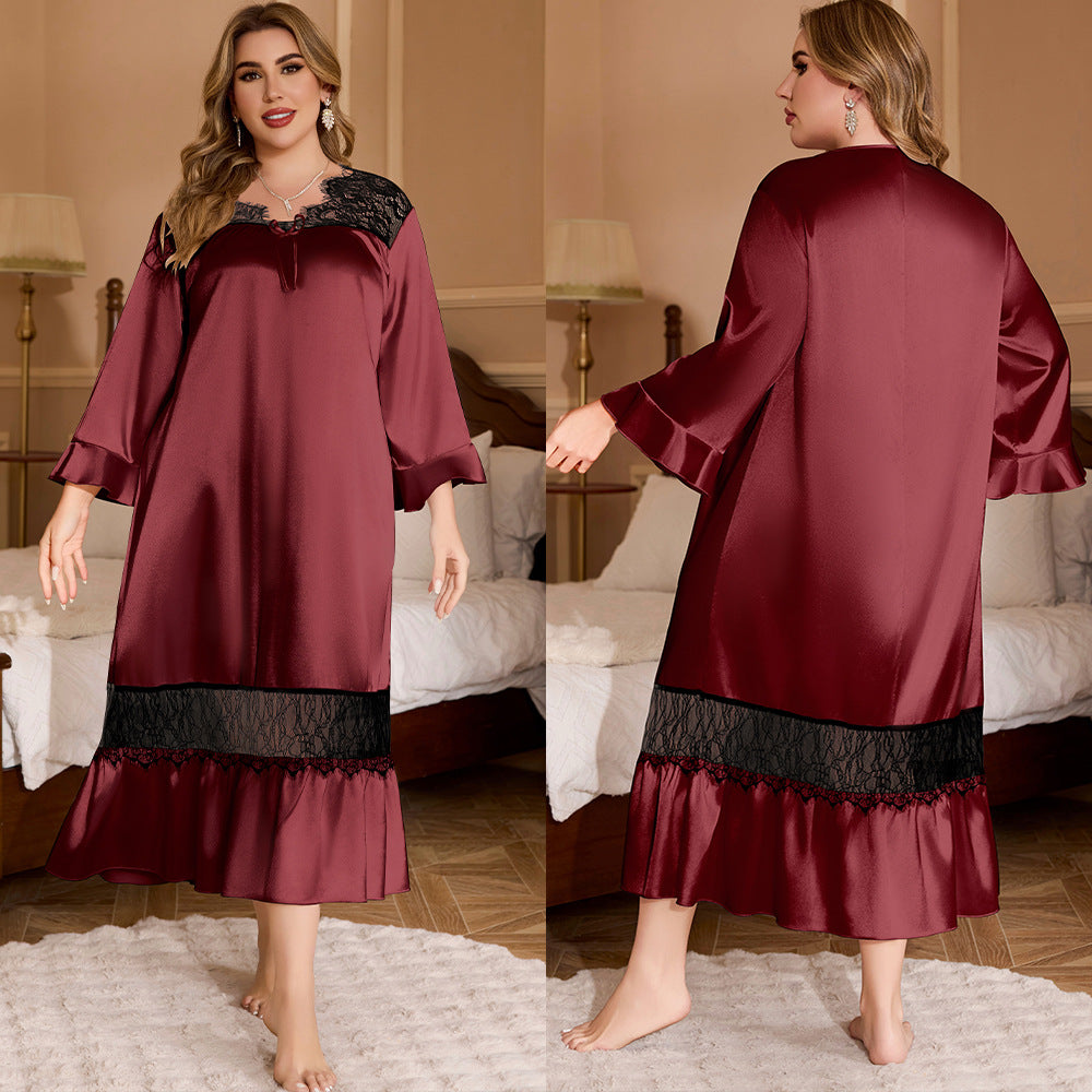 Burgundy satin nightgown with black lace trim on shoulders and hem, long flared sleeves, and a bow on the front.