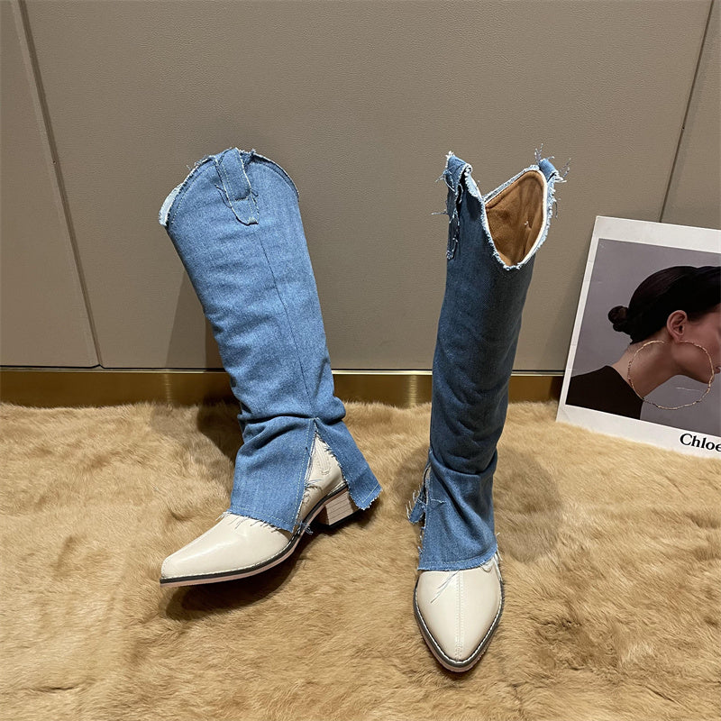 Cream pointed-toe Western boots featuring blue denim shafts with frayed hems and side slits.