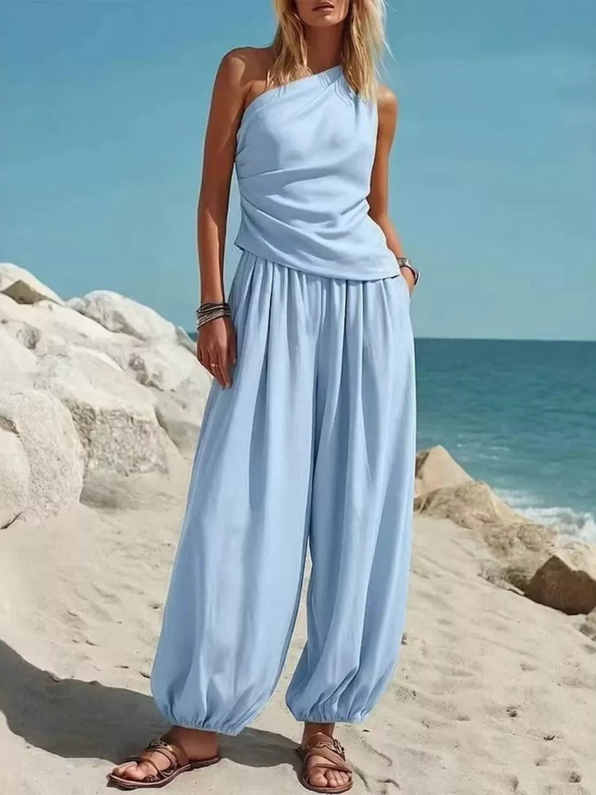 Plus size one-shoulder top and wide-leg pants set by Plush Fashion Hub, featuring a stylish, comfortable design.