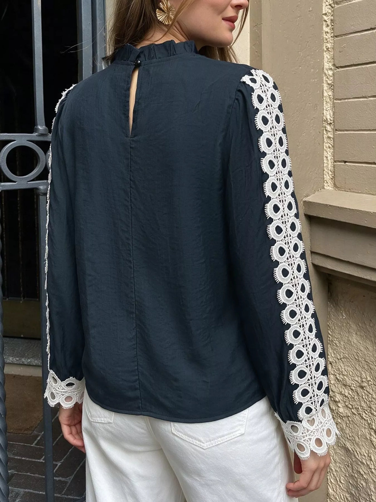 Lace trim long sleeves blouse from Trendsi featuring delicate lace details and a classic fit, perfect for elegant casual wear.