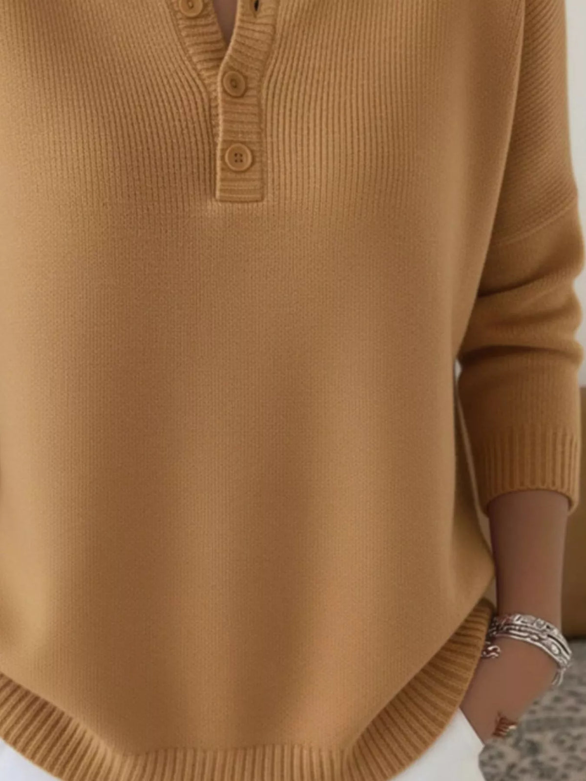 Plus size ribbed knit sweater with button details, featuring a cozy, full-size fit and stylish design by Trendsi.