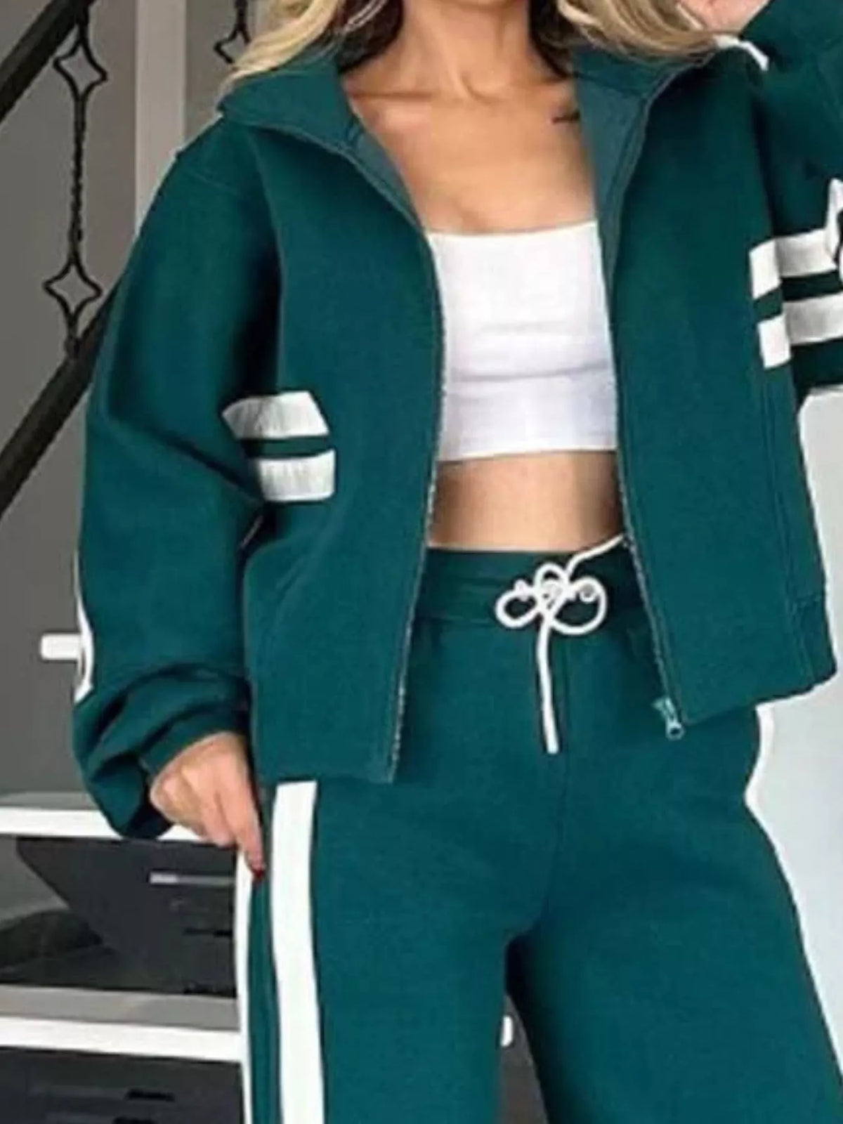 Plus size contrast stripe zip-up activewear jacket and pants set by Plush Fashion Hub, front view showing sporty style and bold stripes.